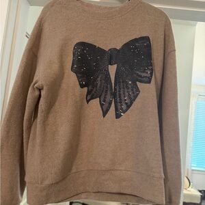 Brown Sweater with Black Bow Design